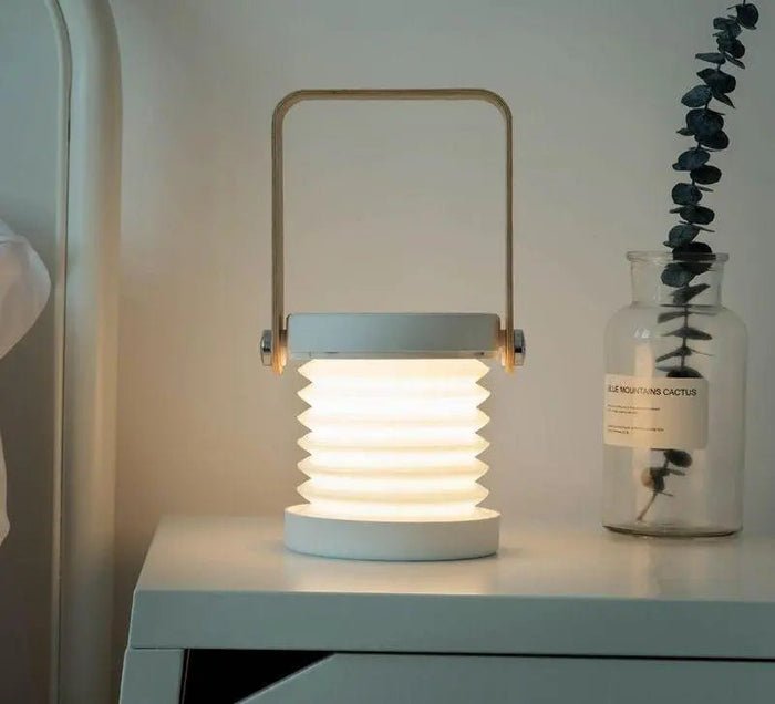 Portable collapsible lantern